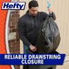 imageHefty Ultra Strong 30 Gallon Trash Bags Large Trash Bags 30 Gallon Size Multipurpose Break Resistant Drawstring Closure Resists Leaks Punctures and Tears Black White Pine Breeze Scent 25 BagsBlack